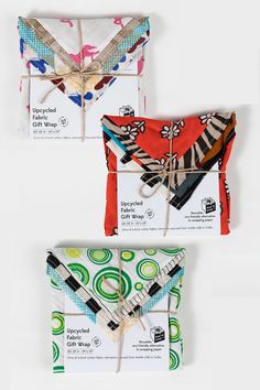 three pieces of fabric tied together to each other in different patterns and colors, including zebras