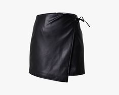 Genuine short leather skirt with string for a bold statement. Perfect for various occasions, this leather skirt offers comfort and style, making it a versatile addition to your wardrobe. - Free shipping on all our skirts - Material: Genuine cowhide leather - Color: Black, Brown - Kindly provide your body size: - Waist” - Hips” - Skirt Length” - It takes approximately seven business days to complete each leather skirt. - The skirt you receive will be similar to the picture, not the exact one, as Side Tie Skirt, Short Leather Skirt, Metallic Cowhide Rug, Short Leather Skirts, Brindle Cowhide, Hand Made Leather, Mens Leather Pants, Leather Waist Bag, Leather Toiletry Bag