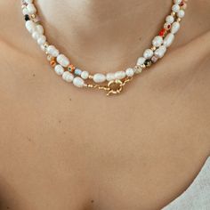 This Millefiori Pearl Necklace is a timeless piece suitable for any season to add a pop of color and fun to your outfit. Each necklace is beaded in a unique pattern, which means each necklace is different from the others, this delicate design makes it perfect for an effortless look. DETAILS:Water Resistant - Allergy-free18k Goldplated Stainless Steel Clasps, Ivory Freshwater Pearls, Millefiori Glass BeadsGold-filled seed beadsONE SIZE 16.5 inches NOTE: All designs are unique, photos are for refe Cheap Colorful Beaded Pearl Necklace, Trendy Beaded Necklace For Gifts, Trendy Beaded Necklaces For Gift, White Bohemian Beaded Necklaces For Spring, Elegant Multicolor Beaded Necklaces For Everyday, Trendy Long Beaded Necklace, Spring Festival Beaded Necklaces With Round Beads, Colorful Beads Spring Festival Necklace, Bohemian Multicolor Pearl Chain Jewelry