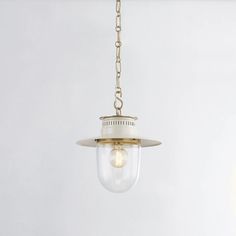 a light fixture hanging from a chain