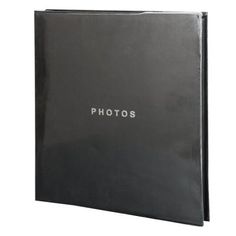 a black photo album with the word photos printed on it's front and side