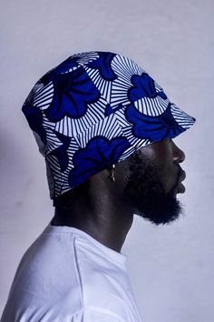 This unisex bucket hat features a fun, vibrant pattern that is also reversible, making it a versatile and stylish accessory. The one size fits most design ensures a secure and comfortable fit for both men and women. Handmade in Ghana Size: 24 inches in diameterPrint: Kissie and Odo Mens Summer Streetwear, St Louis Zoo, Bucket Hat Fashion, Reversible Bucket Hat, Summer Streetwear, Hat Print, Clothes Closet, Male Fashion, Bucket Hats