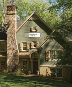 a house with a sign on the front and side of it that says prince paul lodge