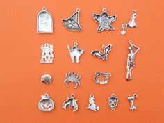 16 Different antique silver tone charms make up this set, ranging from 18 to 42mm Metal Nickel-free Silver Novelty Charms, Silver Novelty Charm Necklace, Nickel Free Silver Themed Charms, Nickel-free Silver Themed Charms, Nickel-free Themed Silver Charms, Nickel-free Silver Charm Necklace For Crafting, Themed Silver Metal Charms, Halloween Charms, Antique Silver