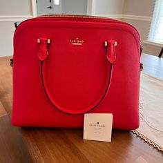 Red Brand New Kate Spade Bag. Never Used. 13 Inch Length, 5.5 Inch Depth, 11 Inch Height. Comes With Removable Strap And Duster Bag. Kate Spade Luxury Red Bag, Kate Spade Red Formal Bag, Luxury Red Kate Spade Bag, Formal Red Kate Spade Bag, Classic Red Kate Spade Bag, Bags Kate Spade, Kate Spade Bags, Kate Spade Bag, Size 13