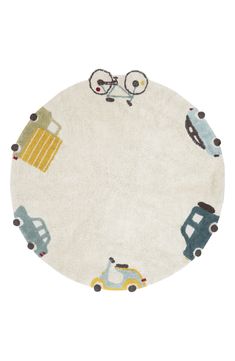 a white rug with cars and trucks on it, in the shape of a circle