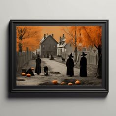 a black and white photo of people dressed up in halloween costumes with pumpkins on the ground