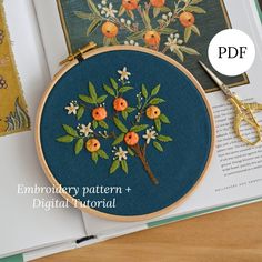 the embroidery pattern is being used to make an embroidered flower bouquet with leaves and flowers