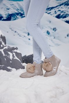 Snuggly and stylish, these SMAIBULUN Ugg boots are the perfect addition to your winter wardrobe. With a chic suede exterior and adorably fluffy faux fur balls, your feet will stay warm and fashionable no matter the temperature. Say goodbye to boring boots and hello to cozy cuteness! 1'' heel 4.6'' shaft 13.2'' circumference Pull-on Leather Suede upper Faux fur lining Rubber sole Beige Sheepskin Boots For Winter, Beige Sheepskin Winter Boots, Casual Faux Fur Boots For Cold Weather, Beige Winter Boots With Faux Fur Lining, Faux Fur Trim Round Toe Boots, Winter Suede Boots With Faux Fur Trim, Winter Faux Fur Boots For Cold Weather, Casual Fluffy Boots With Round Toe, Fluffy Casual Winter Boots