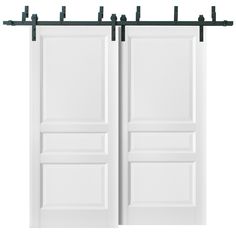 two white doors with black hardware on them