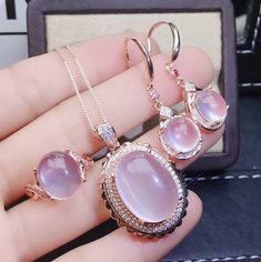 Welcome to Elegant Art Jewelry!  Stone: Natural Rose Quartz Stone Size: ( 8mm×10mm Earrings ), ( 10mmx12mm Ring ), ( 13mmx18mm Pendant ) Side Stone: Zircon Metal: 925 Sterling Silver Personalization: 9K/14K/24K/GOLD/SILVER/PLATINUM/ROSE-GOLD/WHITE GOLD. (Contact me)  Rose Quartz Pendant, Rose Quartz Cuff Pendant, 925 Sterling Silver Pendant, Oval Shape Pendant, Rose Quartz Pendant, Rose Quartz Engagement, Open Design Pendant, Rose Quartz Oval, Rose Quartz Natural, Pink Rose Quartz, Pink Rose Qua Pink Cabochon Jewelry For Anniversary, Pink Oval Cabochon Jewelry For Wedding, Rose Gold Oval Cabochon Jewelry For Anniversary, Rose Colored Round Jewelry For Mother's Day, Round Rose-colored Jewelry For Mother's Day, Pink Oval Cabochon Wedding Jewelry, Rose-colored Round Jewelry For Mother's Day, Pink Oval Jewelry Gift, Rose Gold Oval Jewelry For Mother's Day