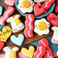 some decorated cookies are sitting on a table