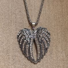 Antiqued Wings Of An Angel To Hug & Comfort You Necklace Chain Measures - 32" And Closes With A Lobster Claw Clasp Silver Tone Crystal Wings Measure - 2" High X 2" Wide Not Including The Bail Very Nice Condition Looks Unused Tiffany Infinity Necklace, Wings Of An Angel, Crystal Wings, Green Onyx Necklace, Angel Wings Necklace, Perfume Jewelry, Crystal Angel, Silver Angel Wings, Flower Statement Necklace