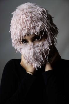 This pink mask features a soft and plush texture, making it both comfortable and stylish. The fringe cord details add movement and a unique touch, while the open eye and nose sections ensure easy breathing and visibility. Designed to elevate your everyday look, this mask is perfect for nightclubs, festivals, and parties, helping you stand out in any crowd. Additionally, it serves as a functional accessory for cold weather or outdoor events, blending style and practicality effortlessly. Fluffy Fringe, Motorcycle Mask, Custom Mask, Pink Mask, Unique Faces, Ski Mask, Functional Accessories, Outdoor Events, Special Design