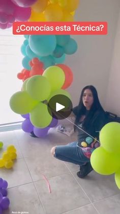 a woman sitting on the floor with balloons in front of her and an ad that reads conoccias est tecnica?