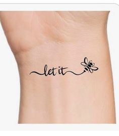 a tattoo with the word let it bee on it's side and a small black insect