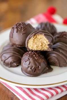 chocolate covered peanut butter balls on a plate