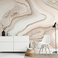 a living room scene with focus on the floor and wallpaper that looks like marble