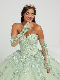 Captivate the room in this 3D floral applique long strapless cape dress with A-line skirt by House of Wu 26070. Romantic quinceañera dress features a strapless sweetheart neckline. The bodice is adorned with three-dimensional lace appliqués that trails past the natural waist and cascades down the sparkle tulle ball gown skirt. Lace-up back, matching lace gloves and cape complete the look. Has a lace-up back and sweep train. The removable gloves and cape are included - giving you a versatile look Dramatic Skirt, Sheer Gloves, Quinceanera Collection, Tulle Balls, Mermaid Evening Gown, Trumpet Dress, Fit Models, Corset Dress Prom, Strapless Sweetheart Neckline