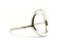 Add a touch of elegance to your jewelry collection with this stunning Sterling Silver 1.8mm Oval Circle Ring, which is also known as a Circle Stacking Ring, Silver O-Ring, Oval Karma Ring, or Oval Open Circle. The ring features a simple yet sophisticated design that is perfect for everyday wear or special occasions. The oval shape of the ring symbolizes balance and harmony, while the open circle design represents the concept of karma and the interconnectedness of all things. This unique combinat Karma Ring, Open Circle Ring, Ring Der O, Ring Simple, Circle Ring, Oval Ring, Oval Rings, Ring Oval, Star Ring