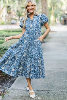 This midi dress is absolutely perfect for you! That paisley print is so feminine and trendy while that fit is perfect for this time of year. It's going to look great with everything from flats to boots.  Collared neckline Button down front... Button Down Midi Dress, Floral Cocktail Dress, Black Tie Dress, Long Sleeve Outerwear, Cute Rompers, Romper With Skirt, Work Attire, Swimwear Collection, Babydoll Dress