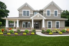 a house with landscaping in front of it