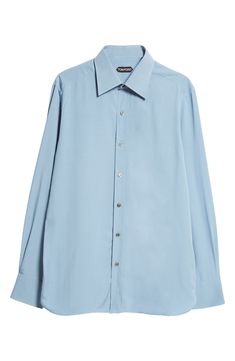 Tom Ford introduces another timeless capsule-wardrobe essential with this silk-kissed button-up elevated with lustrous mother-of-pearl buttons. Front button closure Spread collar Long sleeves with button cuffs 74% lyocell, 26% silk Dry clean Made in Italy Designer Clothing Designer Silk Shirt With Button Cuffs, Luxury Silk Button-up Shirt, Elegant Blue Dress Shirt With Concealed Placket, Designer Silk Shirt With Button Closure, Designer Silk Shirt With Buttons, Elegant Blue Dress Shirt, Silk Tops With Button Closure And Spread Collar, Silk Top With Button Closure And Spread Collar, Elegant Blue Shirt With Button Closure