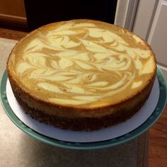 a cake sitting on top of a blue and white plate