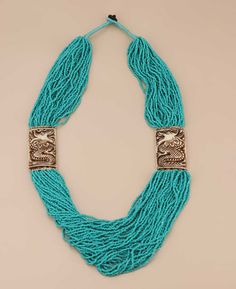 Tibetan artisan necklace Artisan Carved Blue Jewelry, Traditional Carved Blue Jewelry, Dragon Carving, Bone Carving, Necklace Online, Gemstone Bracelets, Linen Clothes, Blue Beads, Hanging Wall Decor