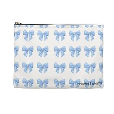 Gorgeous miniature blue bows adorn this accessory pouch. Sophisticated, chic, and luxurious, our pouches come in various sizes and serve a multitude of purposes. Whether as a stylish pencil case or a glamorous cosmetic travel bag, they are made from durable materials and feature a convenient zipper closure. .: 100% Polyester.: Machine Washable on Gentle Cycle.: Flat corners .: Non-woven white or black laminate inside.: Assembled in the USA from globally sourced parts .: Multiple sizes: Small (Length, in 8.35, Height , in 5.98) Large (Length, in 11.81 Height , in 8.35) Blue Zipper Pouch Cosmetic Clutch Bag, Blue Zipper Clutch Cosmetic Bag, Blue Clutch Cosmetic Bag With Zipper, Blue Zipper Pouch Cosmetic Bag Gift, Blue Pouch Pencil Case For Gift, Blue Pouch Pencil Case As Gift, Blue Pencil Case Pouch For Gift, Blue Pencil Case Pouch As A Gift, Chic Zipper Pouch As Gift