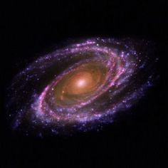 an image of a spiral galaxy in the night sky