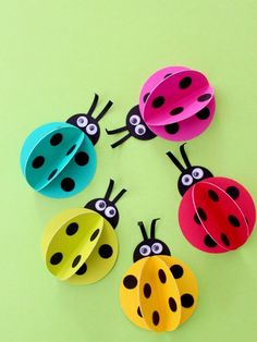 four paper ladybugs sitting on top of each other