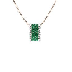 Look at this stunning two tone Emerald pendant. It features fully pave set gorgeous diamonds in the centre and dotted border like design as the outer border in a 14k Rose Gold of your choice. Adorn this pendant everyday We only use Natural AAAA Emeralds which are the top 15% of all real / genuine Emeralds available. They are rich green, moderately to slightly included and exhibit high brilliance. This quality is typically used in fine jewelry by the 5th Avenue or Rodeo Drive Jewelers. Rodeo Drive, 5th Avenue