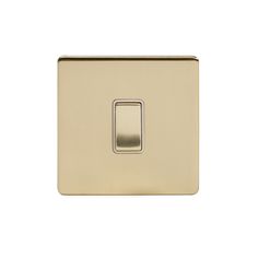 an image of a light switch on a white background in the style of brushed brass