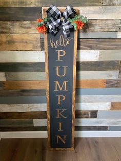 a wooden sign that says hello pumpkin and has a bow on the front saying fall porch signs