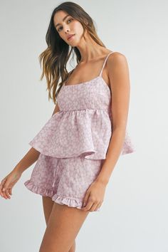 Elevate your summer style with our Pippa Floral Jacquard Peplum Top & Ruffled Short Set! This matching set features a luxurious floral jacquard silk fabric with a playful pink floral print. The adjustable spaghetti straps and ruffled shorts add a touch of femininity, making it perfect for any occasion. Upgrade your wardrobe with this must-have set! Cheap Pink Embroidered Sets, Cheap Embroidered Pink Sets, Ruffled Shorts, Pink Floral Print, Floral Jacquard, Ruffle Shorts, Short Set, Girly Girl, Silk Fabric