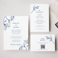 the wedding stationery is laid out on top of each other