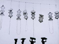 there are many different objects hanging on the line with one object in the foreground