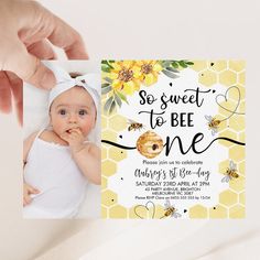 a person holding up a baby's bee birthday card with the words, sweet to be one on it