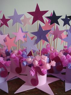 pink and purple cupcakes with stars on them