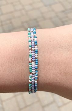 Dainty Seed Bead Bracelets. The beads are 11/0 aka 2mm in size. There are 3 color options (blue, green, lilac) with the choice of silver or rose gold. The most common bracelet size is 7 inches :). Send me a messaged you'd like a special clasp for an anklet! Each bracelet is finished with a crimp bead to lengthen the lifespan of your bracelet!  You can stack these bracelets with bracelets from my shop or with other accessories of your choice! These are also perfect for a minimalist look!  Feel fr Bracelets Seed Beads, Small Bead Bracelet, Jewelry Beach, Stackable Bracelets, Bead Bracelets, Beach Accessories