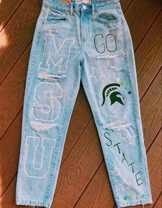 Painted Pants For Homecoming, Painting Pants For Homecoming, Junior Pants Ideas, Junior Jeans Painted, Cheer Painted Jeans, College Pants Diy, Painted Jeans School Spirit College, Spirit Week Jeans Ideas, College Decision Jeans