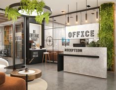 an office lobby with plants growing on the wall and reception desks in front of it