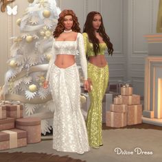 two women standing next to each other in front of a christmas tree