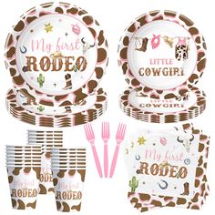 a set of pink and brown baby showerware with giraffe print on it