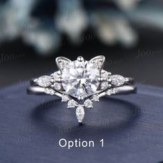 an image of a diamond ring with the words option 1 written below it on top