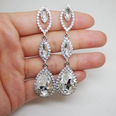 Austrian Crystal Bride Wedding Teardrop Art Deco Earrings Silver-Tone Crystal Teardrop Chandelier Earrings For Gifts, Silver Pear-shaped Chandelier Earrings For Gifts, White Pear-shaped Chandelier Earrings For Gift, Silver Dangle Earrings For Wedding Gift, Personal Jewelry, Deco Earrings, Art Deco Earrings, Austrian Crystal, Bride Wedding