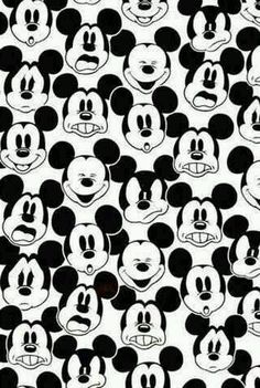 mickey mouse faces on black and white background