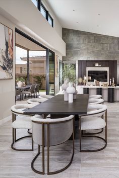 Luxury dining room with high ceilings and outdoor living access. Room Design Inspiration, Outdoor Topiary, Spacious Office, Covered Balcony, Living In Arizona, Two Story Foyer, Flex Room, Luxury Dining Room