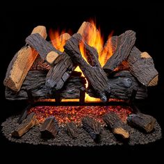 a fire is burning in the fireplace with logs